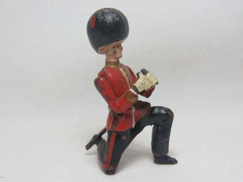 Vintage British Guardsman with binoculars lead soldier