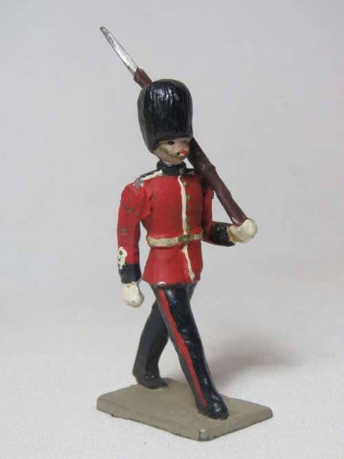 British lead soldier marching with rifle