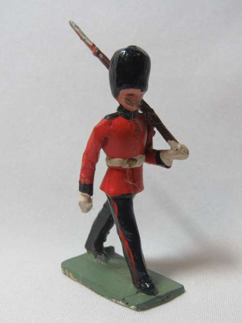 British lead soldier marching with rifle