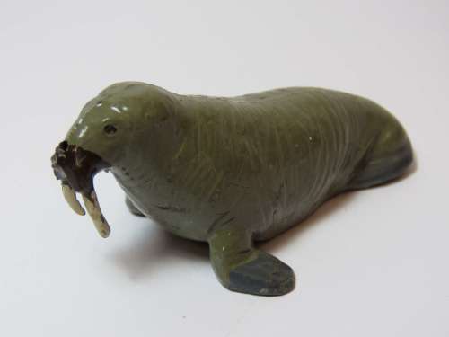 Vintage sea lion lead figurine