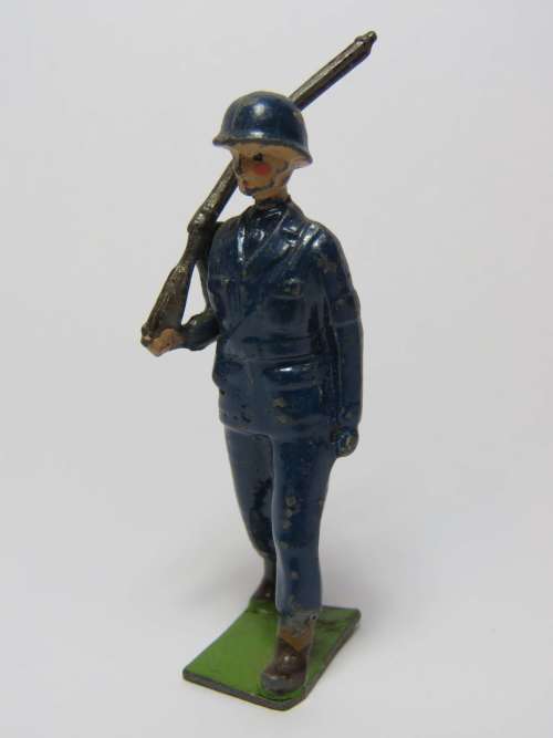 Vintage Police lead soldier marching with rifle