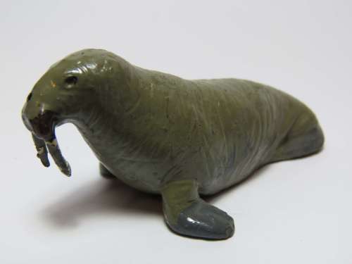 Vintage sea lion lead figurine