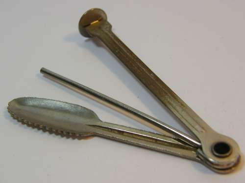 Vintage pipe stopping tool & cleaner