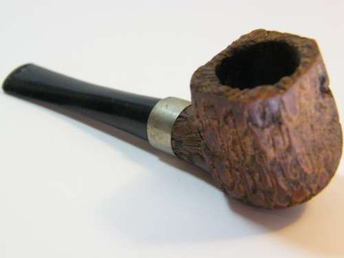 Rough cut wooden smoking pipe