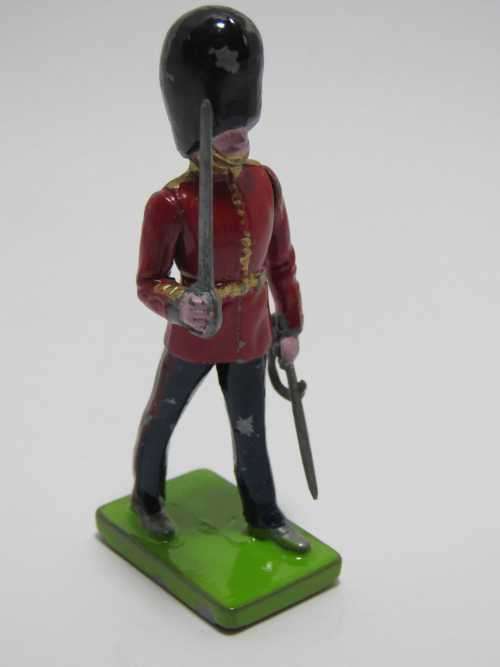 British marching soldier with two swords
