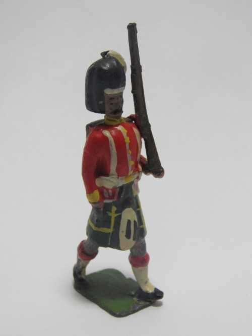Scottish Highlanders marching lead soldier
