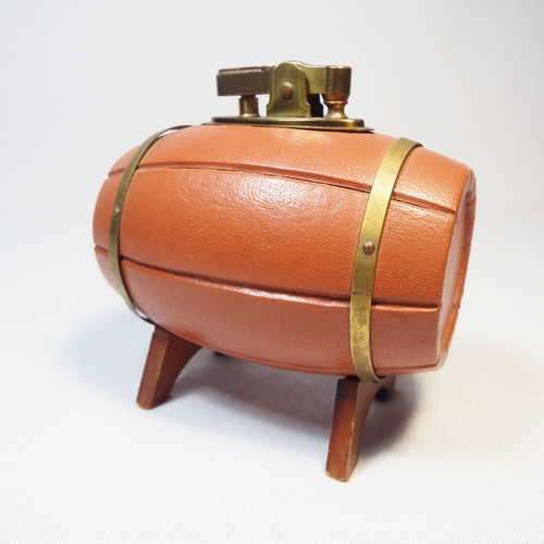 Leather clad barrel shaped table lighter
