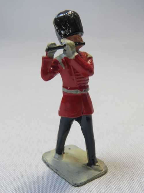 British marching band flute player lead soldier