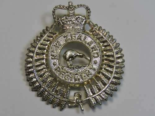 New Zealand regiment cap badge - Used 1947-1964 - One lug bended