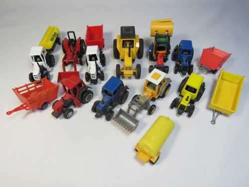 Lot of toy tractors and trailers