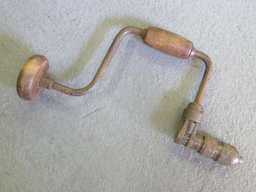 Vintage hand drill with wooden handles