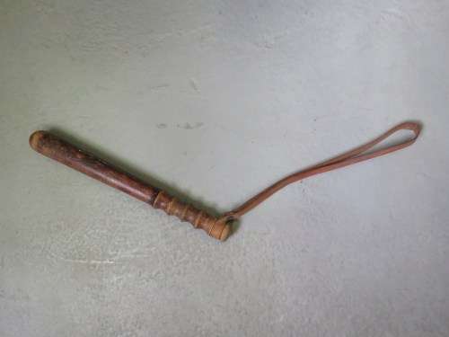 Old wooden military police baton