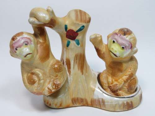Pair of porcelain monkeys salt and pepper set