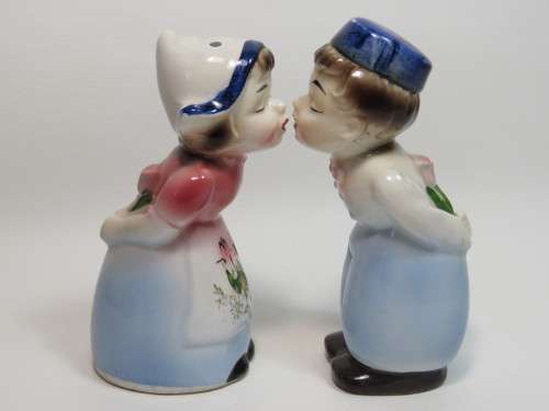 Pair of Dutch kissing couple salt and pepper shakers