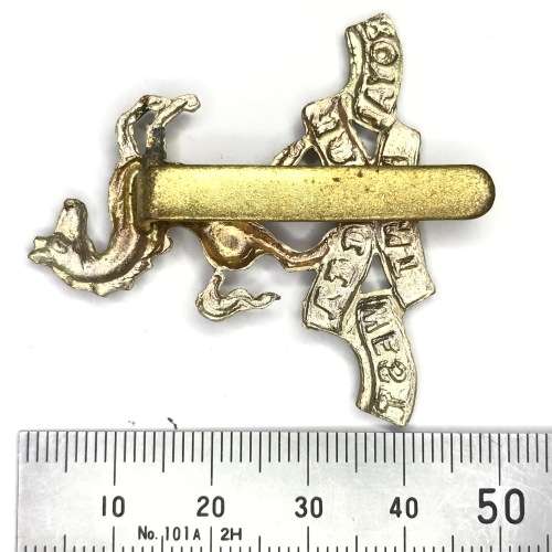 Royal West Kent Regiment cap badge with slide