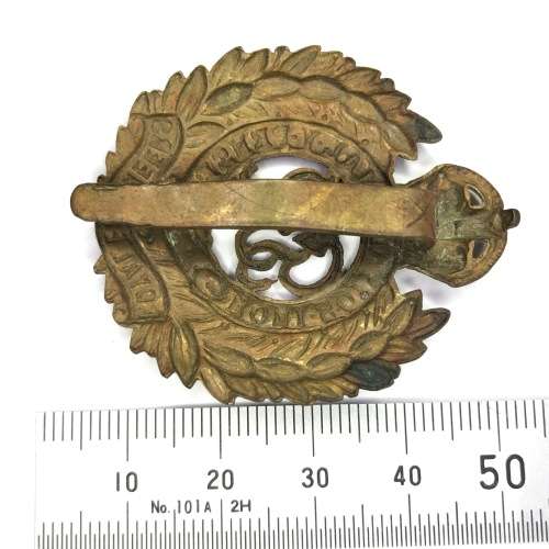 British Royal Engineers cap badge with slide