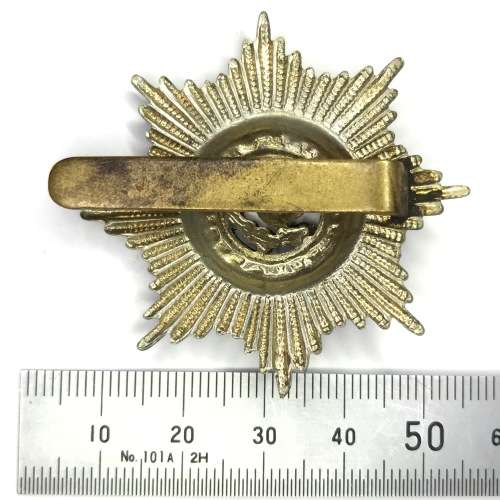 The Cheshire regiment cap badge with slide