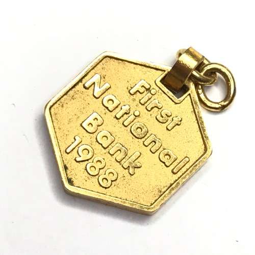 Lot of 2 First National Bank badges