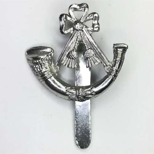 British Light Infantry Regiment cap badge with slide