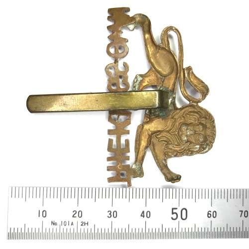 The Kings own Royal Lancaster regiment cap badge with slide