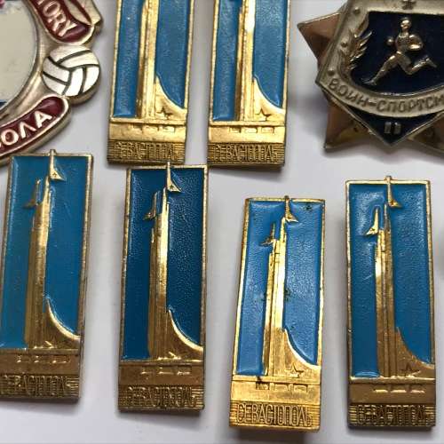 Lot of 11 Russian propaganda badges - many duplicates