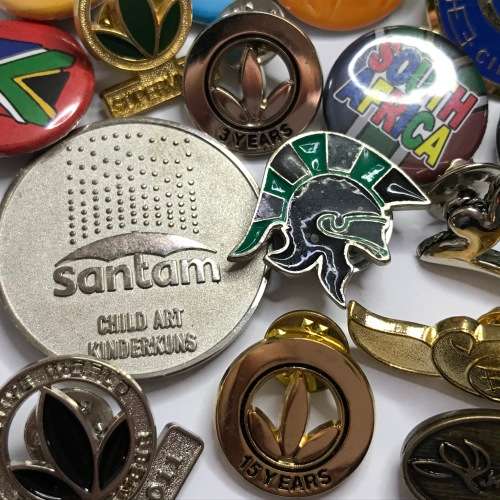 Lot of 17 lapel badges - some with pins and some with magnet