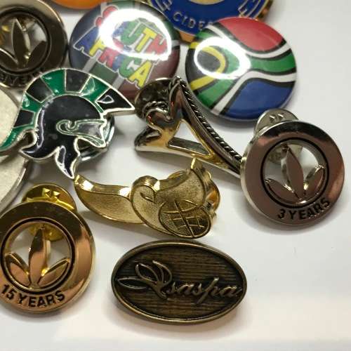 Lot of 17 lapel badges - some with pins and some with magnet
