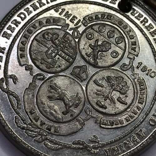 1910 Union of South Africa commemoration medallion with springbok clip