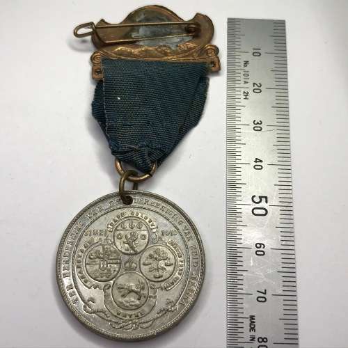 1910 Union of South Africa commemoration medallion with springbok clip