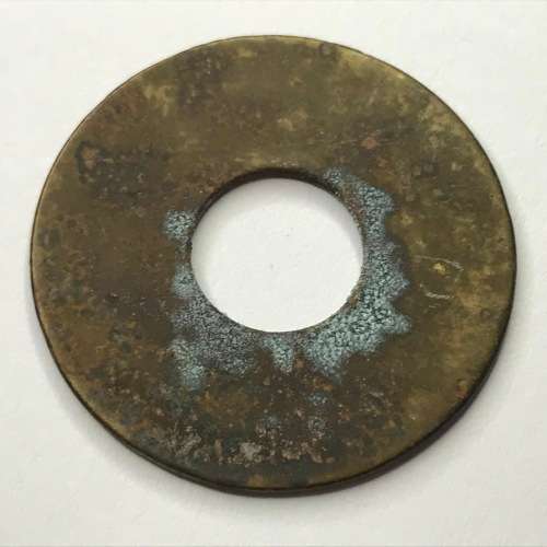 De Beers Consolidated mines one shilling token with central hole