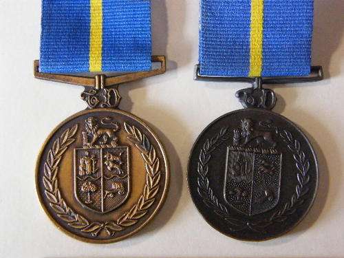 2 Different types of Police Faithful service medals, issued to Maluleke and Debeila