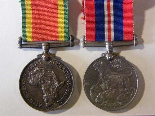Pair of WW2 medals issued to JA Murray 207438 - as per photo