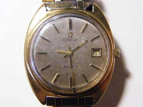 Omega Quartz mens wristwatch, not working and with incorrect strap