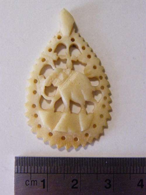 Vintage Ivory pendant with elephant