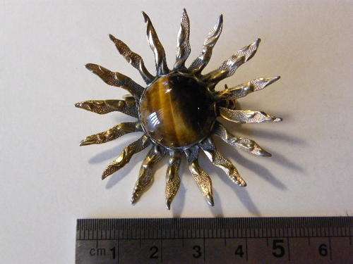 Tigers eye sun brooch