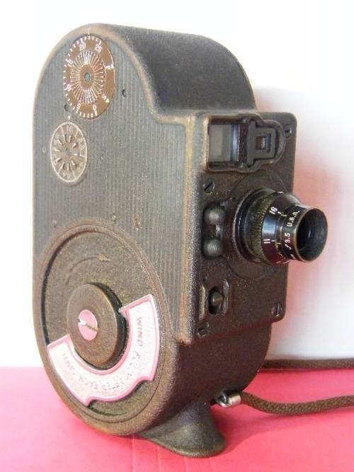 Bell & Howell Filmo 8mm movie camera with hard leather case