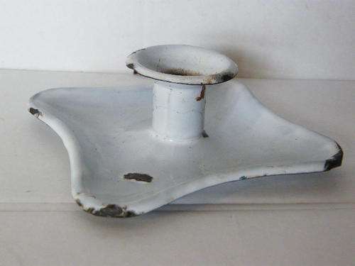 Enamelled candle holder in very unusual shape