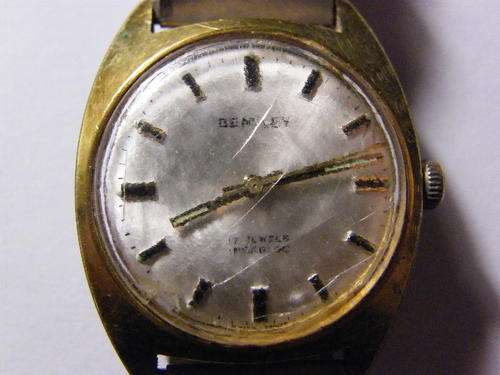 Bentley mens manual wind wristwatch, runs and then stops, needs new glass