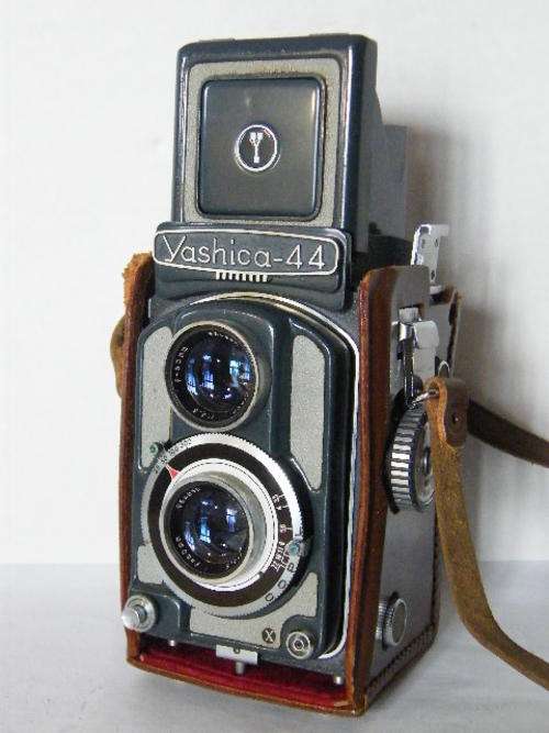 Yashica 44A reflex twin lens camera with leather case, in original box with booklet