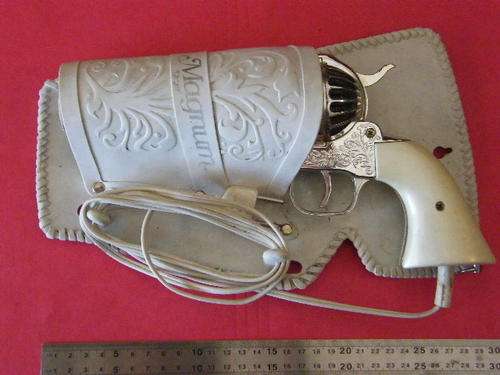 Magnum Hand gun hair dryer in working condition, very nice, 220 volts
