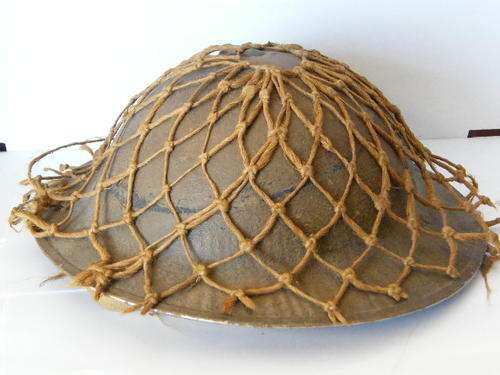 WW2 North Africa British/South African helmet with netting ( loose )