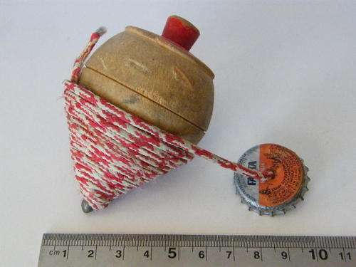 Vintage wooden spinning top as per photo