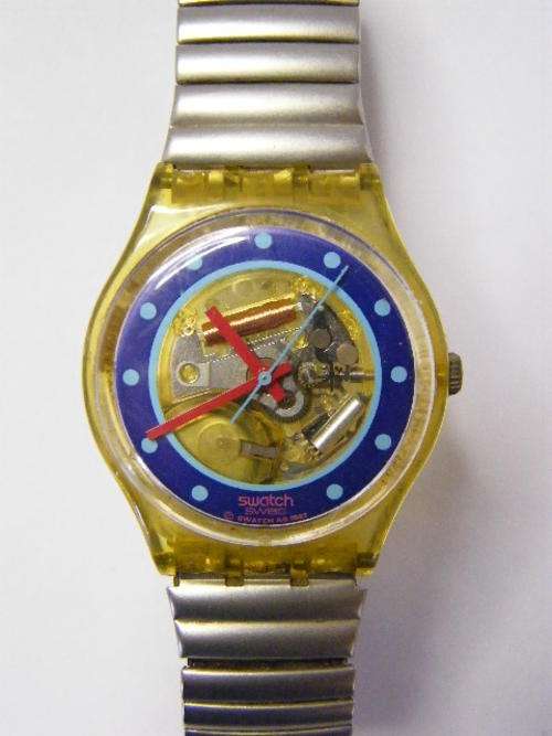Swatch Tin Toy Skeleton Watch with Swatch Flexi Strap - Working, needs new battery - as per photo