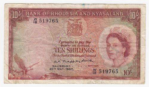 Rhodesia & Nyasaland 10 Shillings 1960 issue - With some small staple holes - as per photo