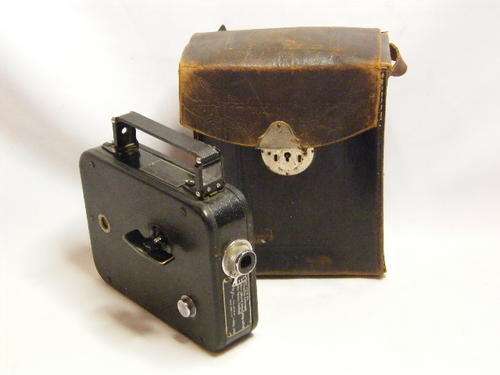 Vintage Cine-kodak Eight Model 20 movie Camera in leather case, loose stitching, as per photo