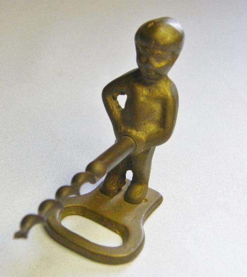Vintage brass Manneken Pis corkscrew and bottle opener - as per photo