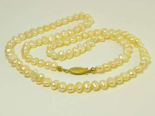 Vintage String of Freshwater Pearls with  gold color clasp - 62 cm in length - as per photo