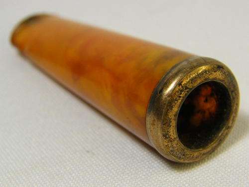 Vintage cigarette mouthpiece holder with gold color trimming - some chips - as per photo
