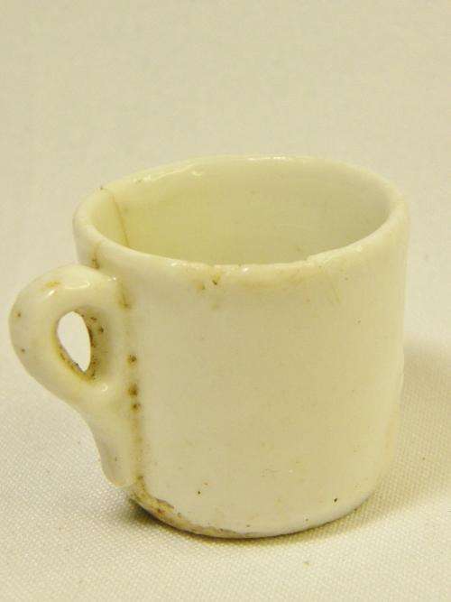 Antique miniature doll house porcelain coffee cup - cracked with chip - as per photo
