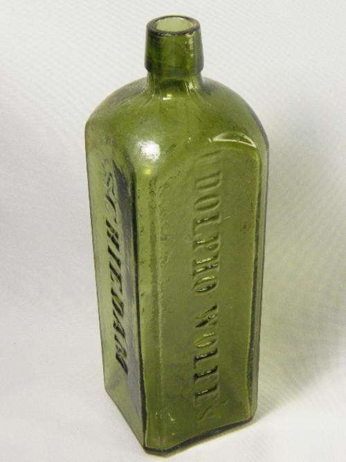 Udolpho Wolfe`s Aromatic Schnapps green antique glass bottle - as per photo